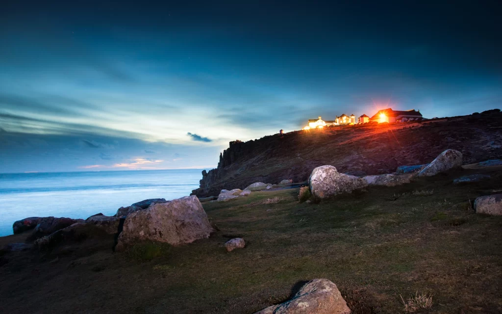 Twilight Cliffs Houses Lights Ocean Rocks