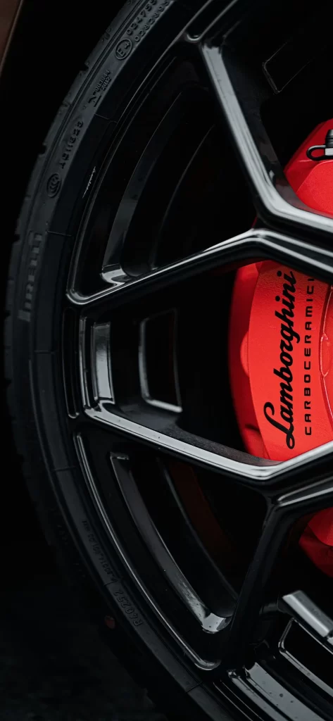 Black and Red Car Wheel with Lamborghini Logo