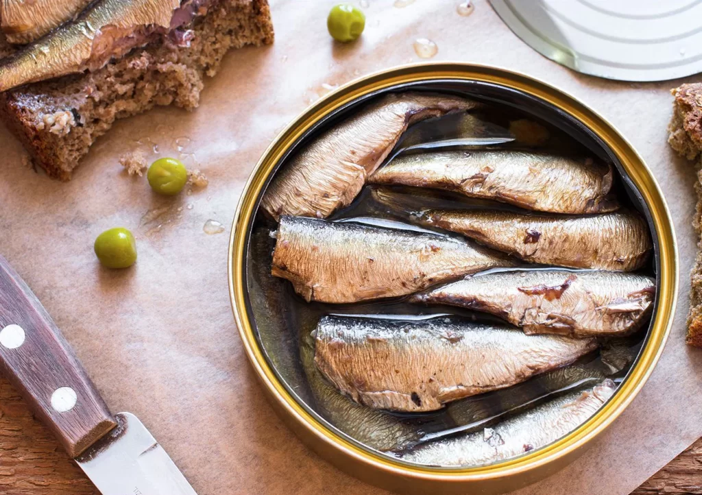 Canned Sardines Rustic Wooden Table Knife Olives