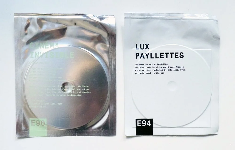 CD Packaging Minimalist White Silver Luxurious Design