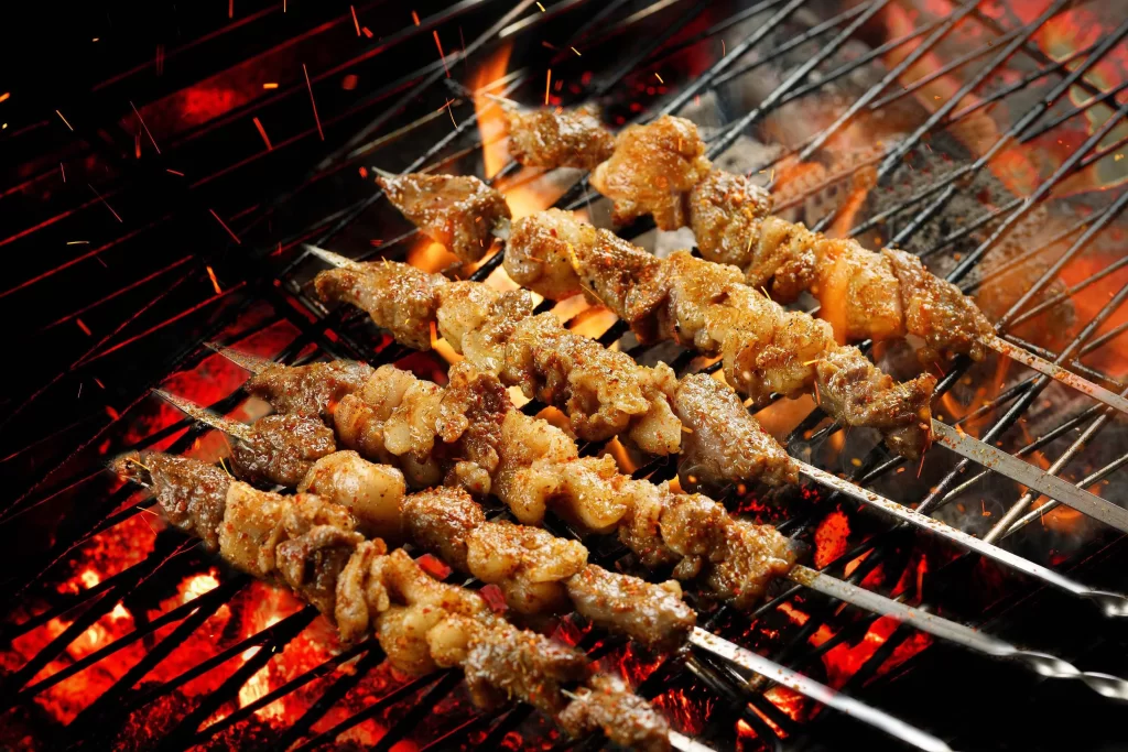 Charred Chicken Skewers Spicy Seasoning Golden Crust Close Up