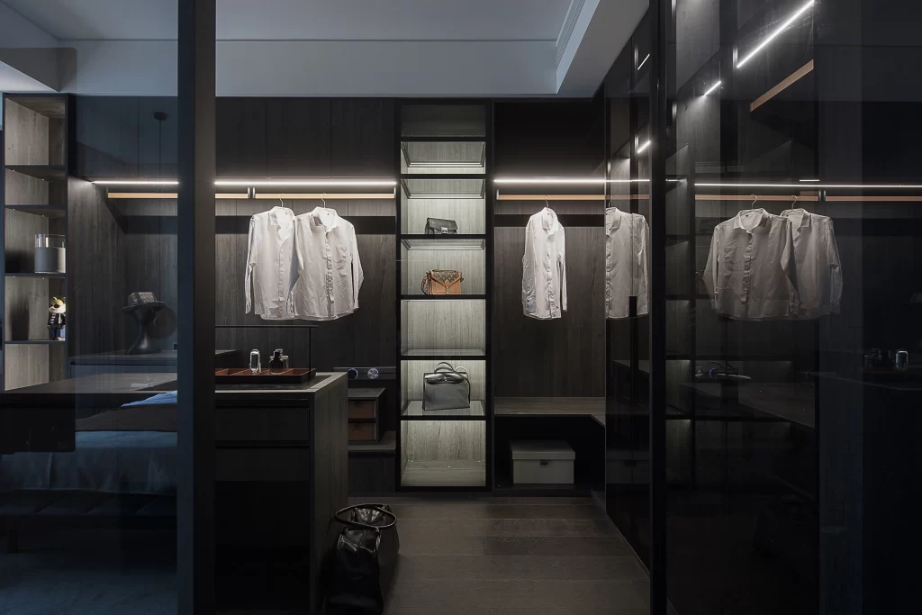 Closet Dark Wood Neutral Lighting Glass Doors