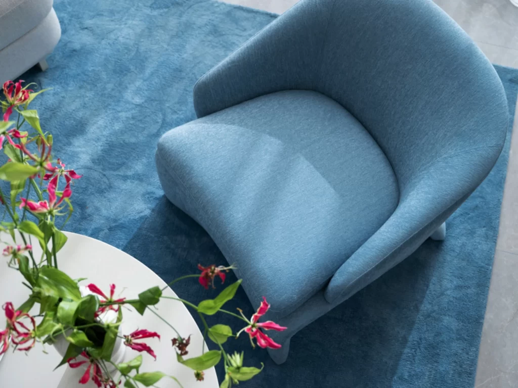 Contemporary Blue Chair Soft Textures Neutral Tones