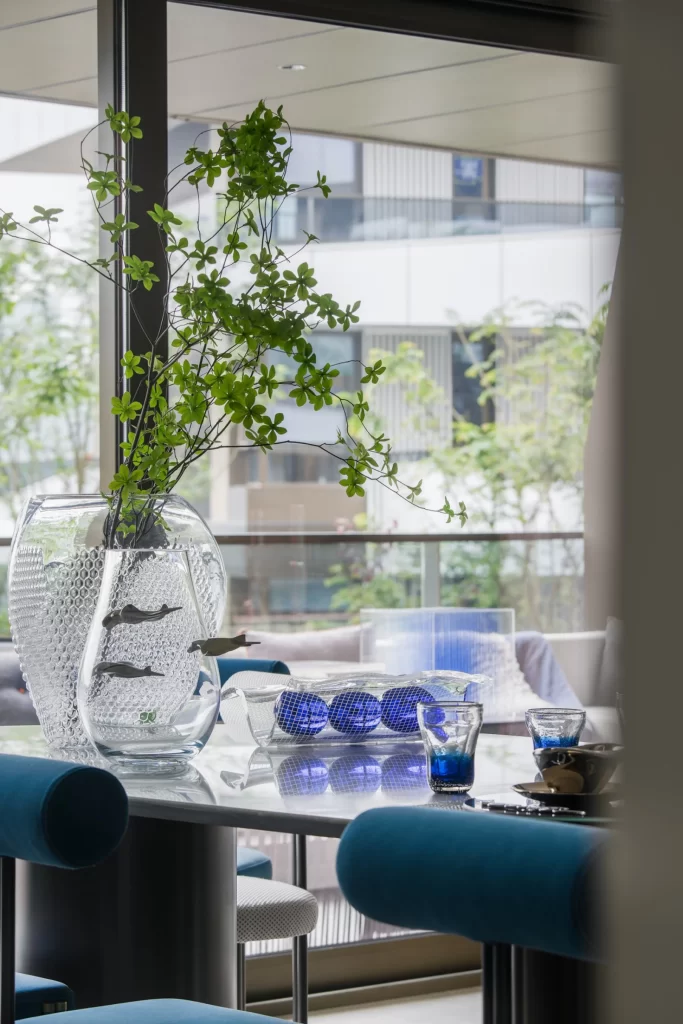 Contemporary Dining Space Blue Green Glass Minimalist