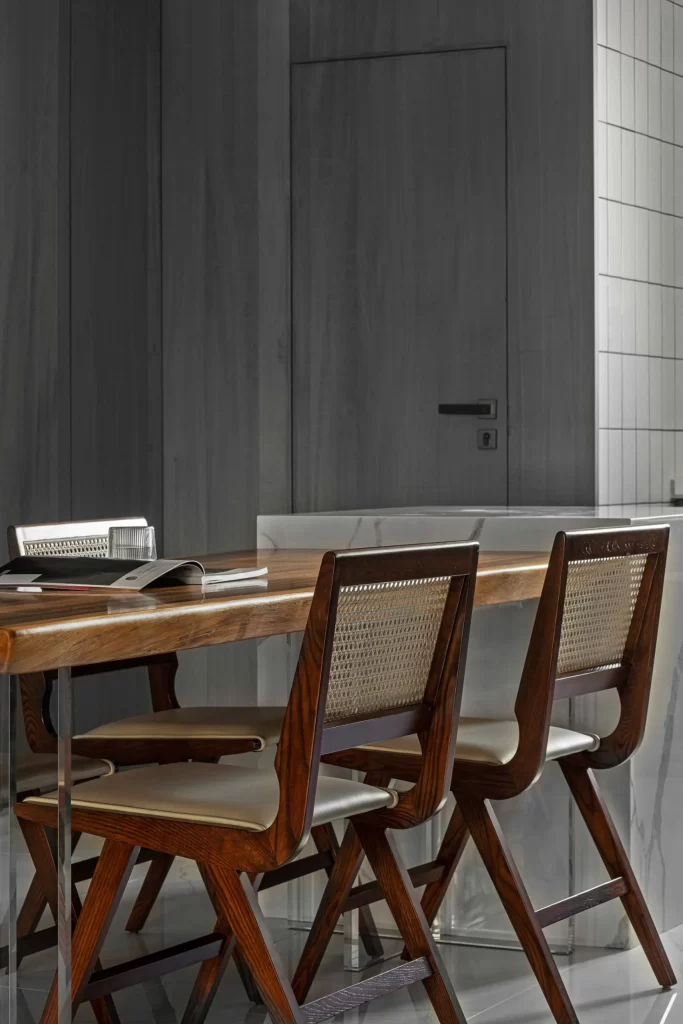 Contemporary Dining Space Dark Wood Neutral Tones Minimalist