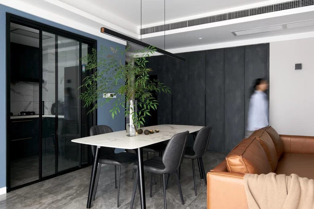 Contemporary Dining Space Neutral Tones Black Accents Minimalist Design