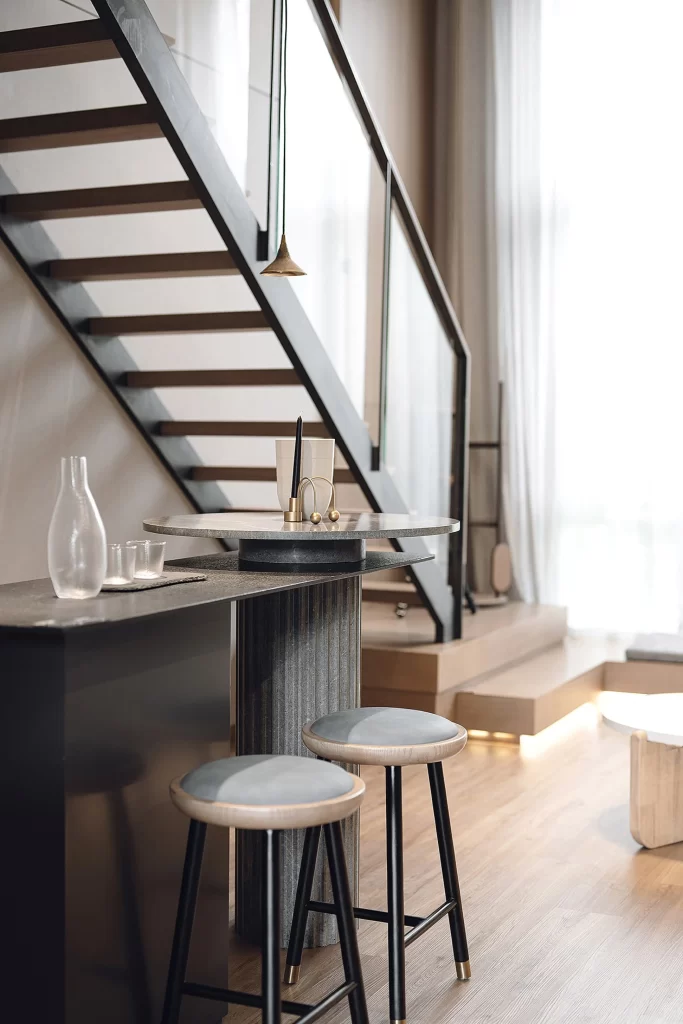 Contemporary Industrial Dining Space Neutral Tones Wood Accents