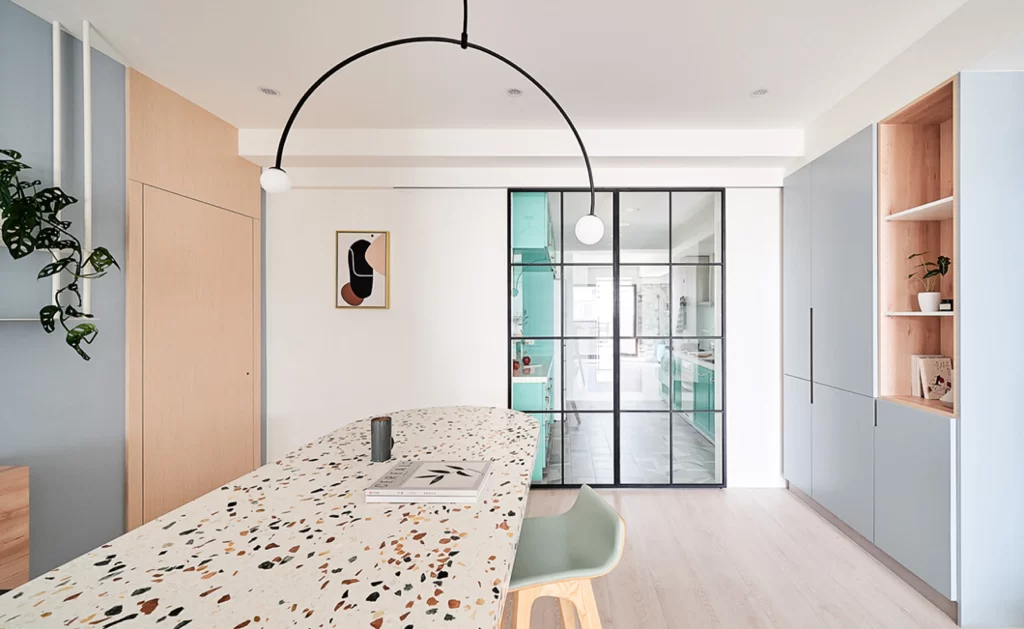 Contemporary Kitchen Terrazzo Table Light Wood Pastel Colors Black Accents
