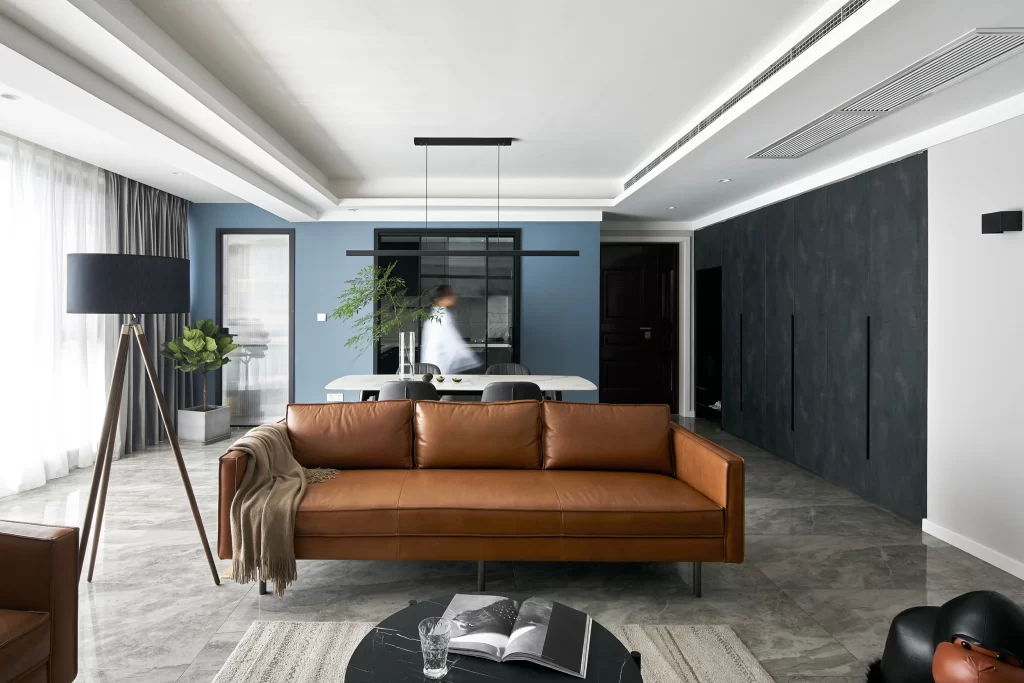 Contemporary Living Space Blue Gray Leather Sofa Neutral Tones