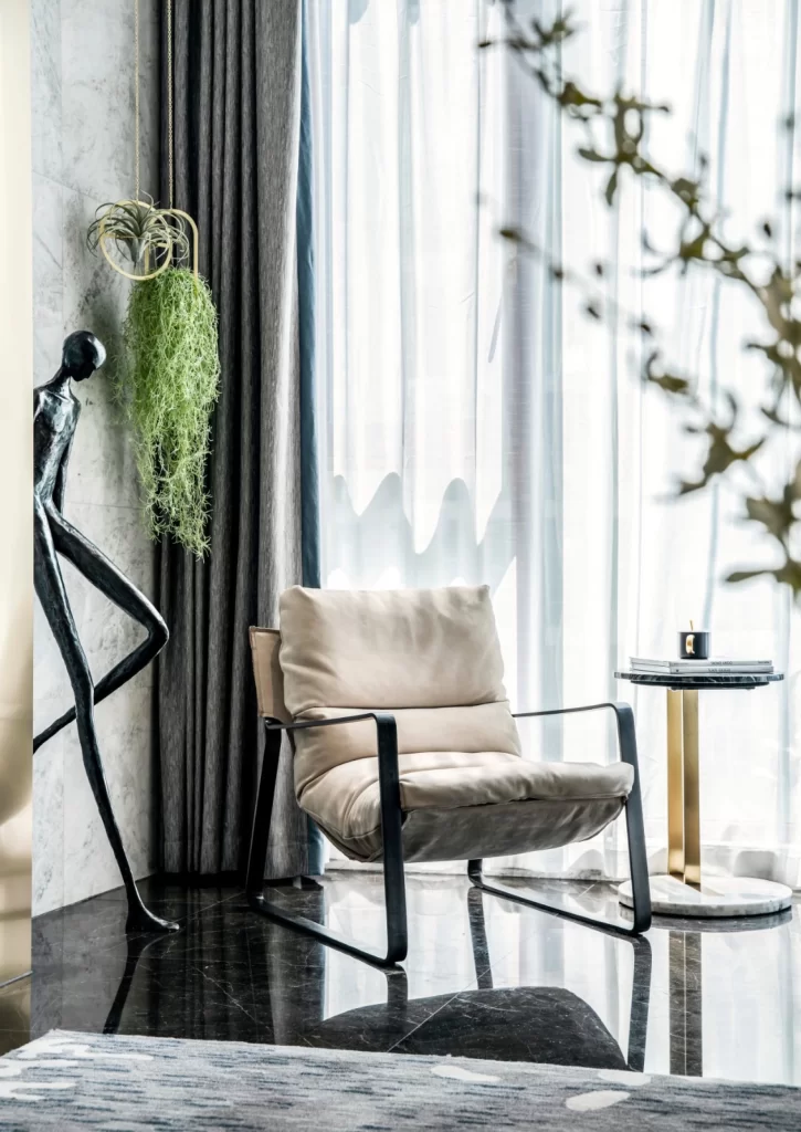Contemporary Lounge Beige Black Gold Accents Greenery