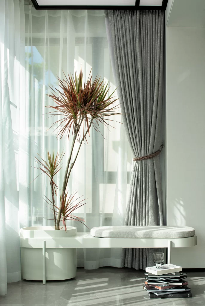 Contemporary Minimalist Reading Nook White Neutral Greenery Natural Light