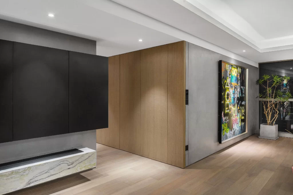 Contemporary Modern Living Space Neutral Tones Light Wood Paneling Artistic Accents