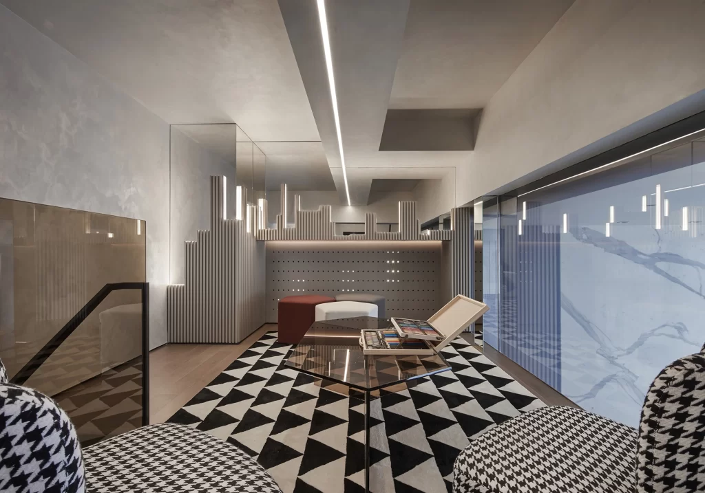 Contemporary Office Space Geometric Patterns Neutral Tones Glass Walls Modern Furniture