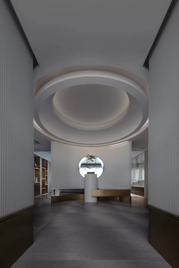Contemporary Reception Area White Neutral Soft Lighting Geometric Shapes