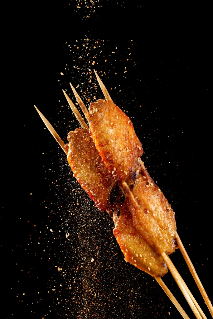 Crispy Pork Skewers Sesame Seeds Golden Brown Close Up