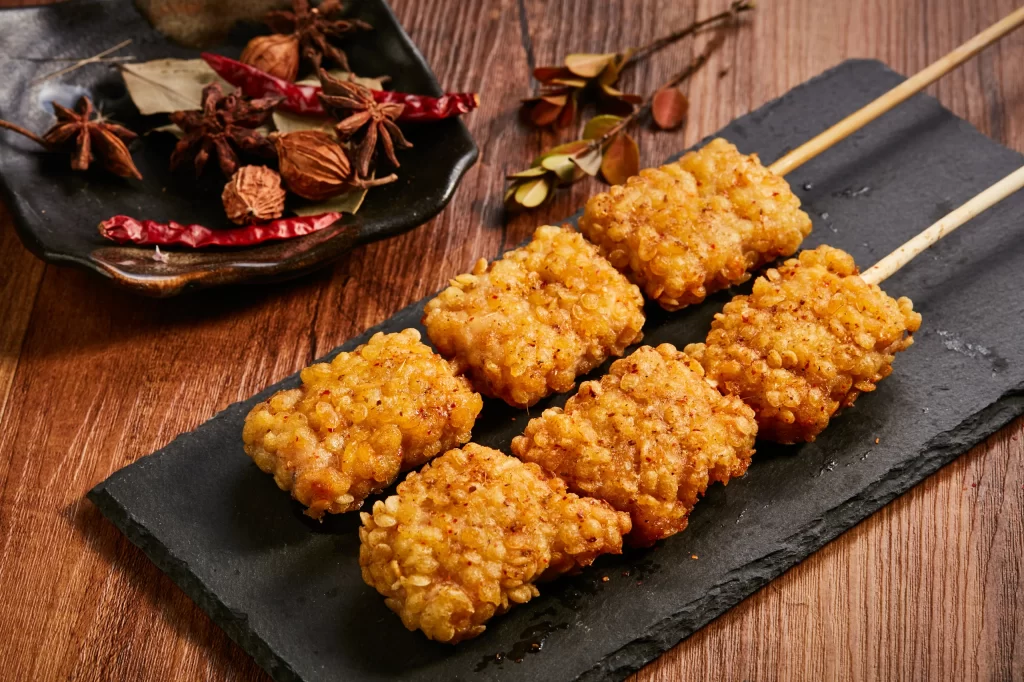 Crispy Rice Balls Skewers Golden Brown Spices Garnish