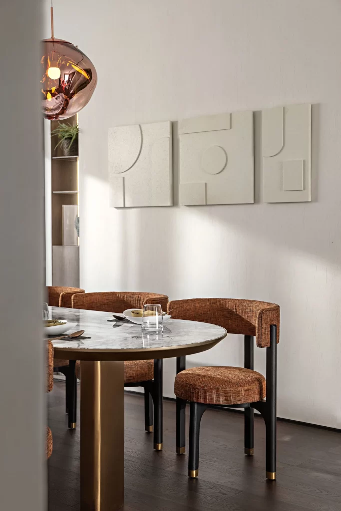 Dining Room Contemporary Warm Tones Marble Table Geometric Art