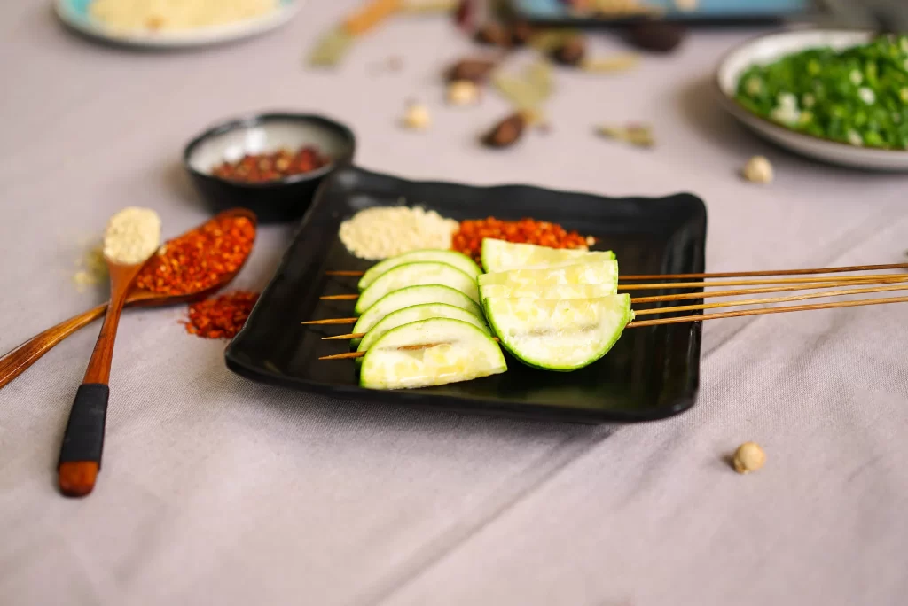 Fresh Zucchini Skewers Lightly Charred Black Plate