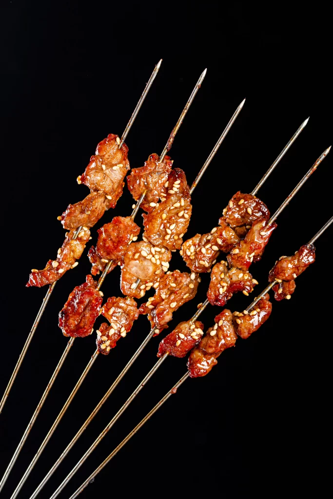 Glistening Beef Skewers Sesame Seeds Golden Brown