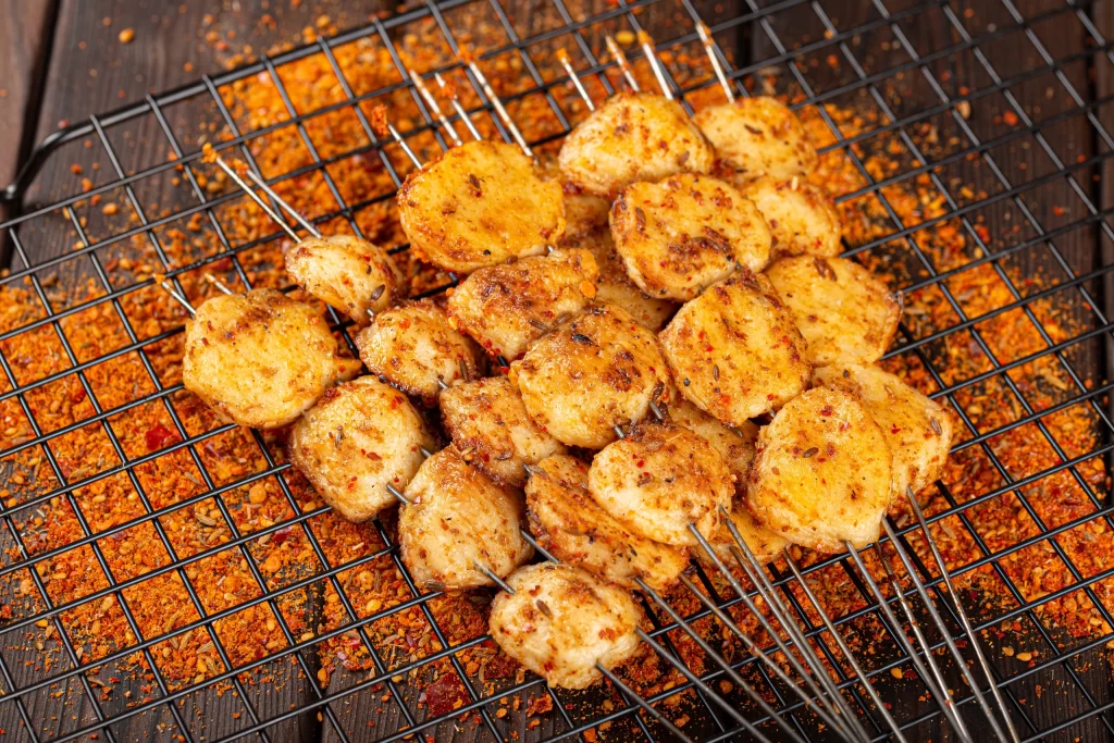 Golden Brown Chicken Kabobs with Spicy Seasoning on Grill