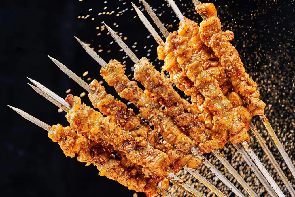 Golden Brown Chicken Skewers with Sesame and Red Pepper Flakes