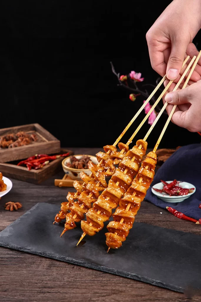 Golden Chicken Skewers Sesame Garnish Black Slate Plated