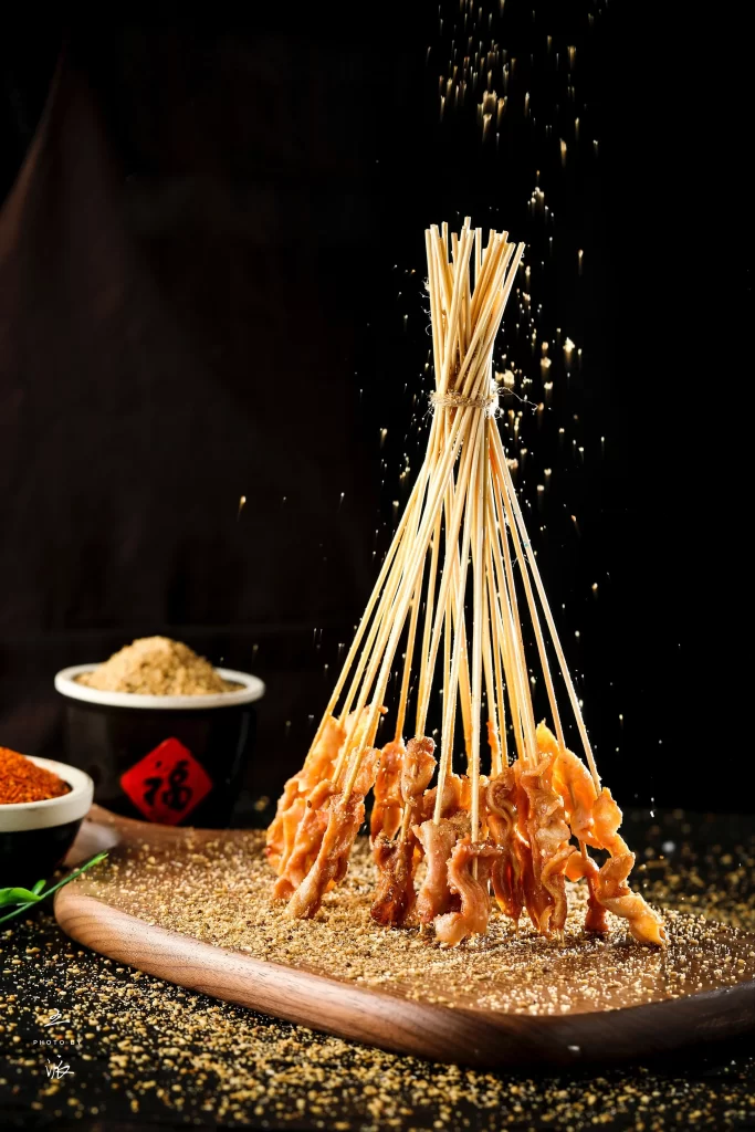 Golden Pork Skewers Cumin Powder Charred Crust Plated