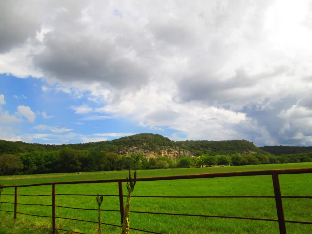 Green Grass Field Blue Sky White Clouds Rusty Fence