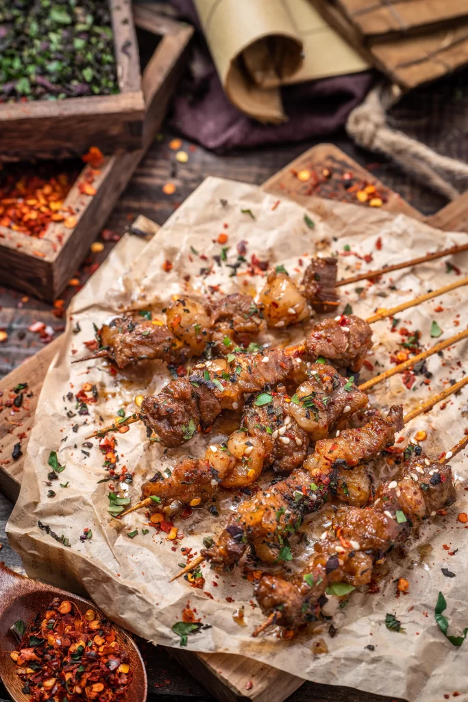 Grilled Beef Skewers Spicy Marinade Charred Edges Garnish
