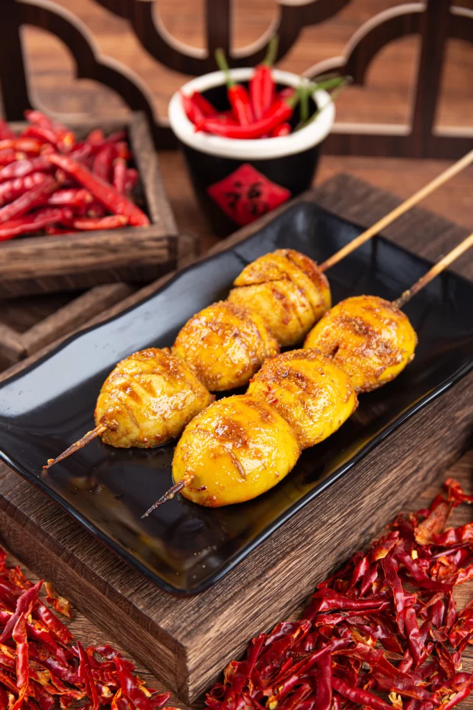 Grilled Egg Skewers Spicy Sauce Charred Exterior