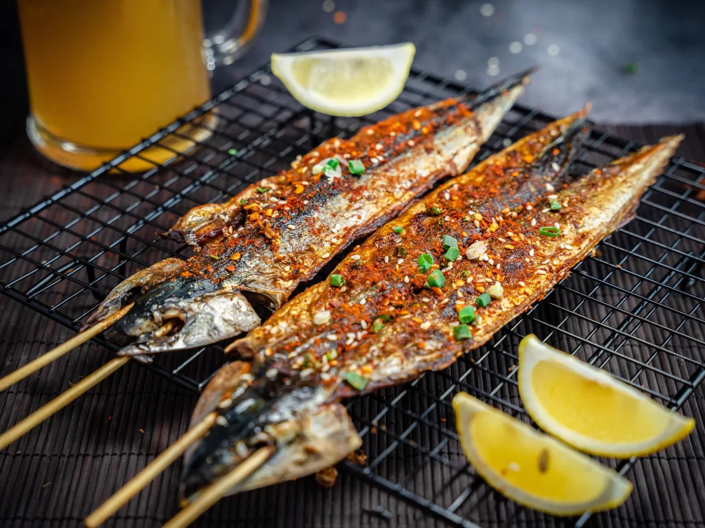Grilled Fish Skewers Spicy Sauce Charred Appearance Garnish