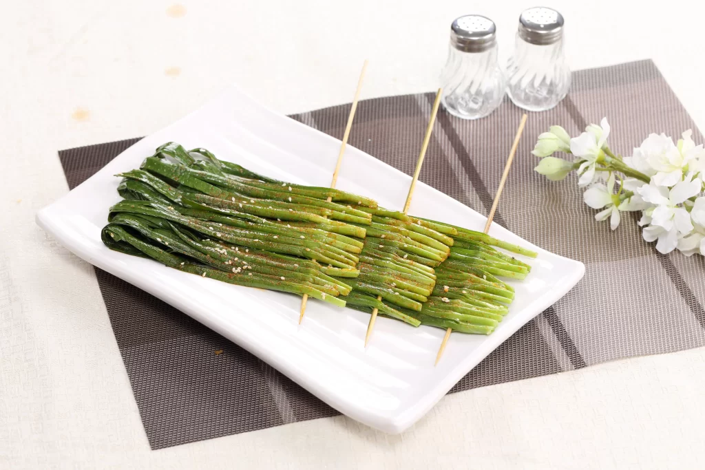 Grilled Green Onions Sesame Seeds White Plate