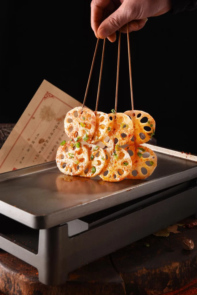 Grilled Lotus Root Skewers Spicy Sauce Green Onion Garnish