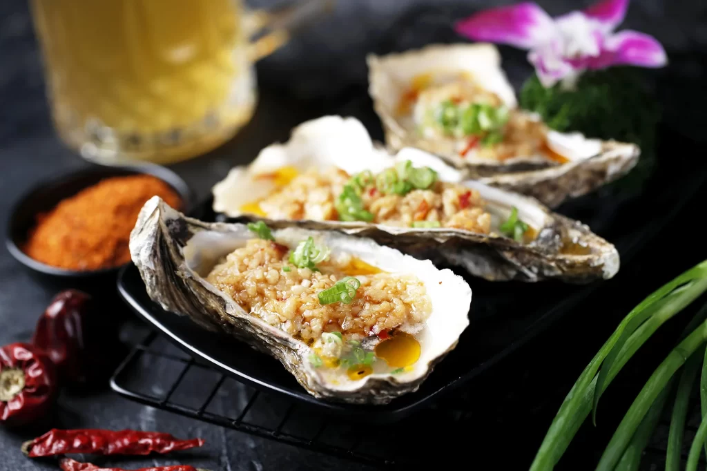 Grilled Oysters with Garlic and Green Onions