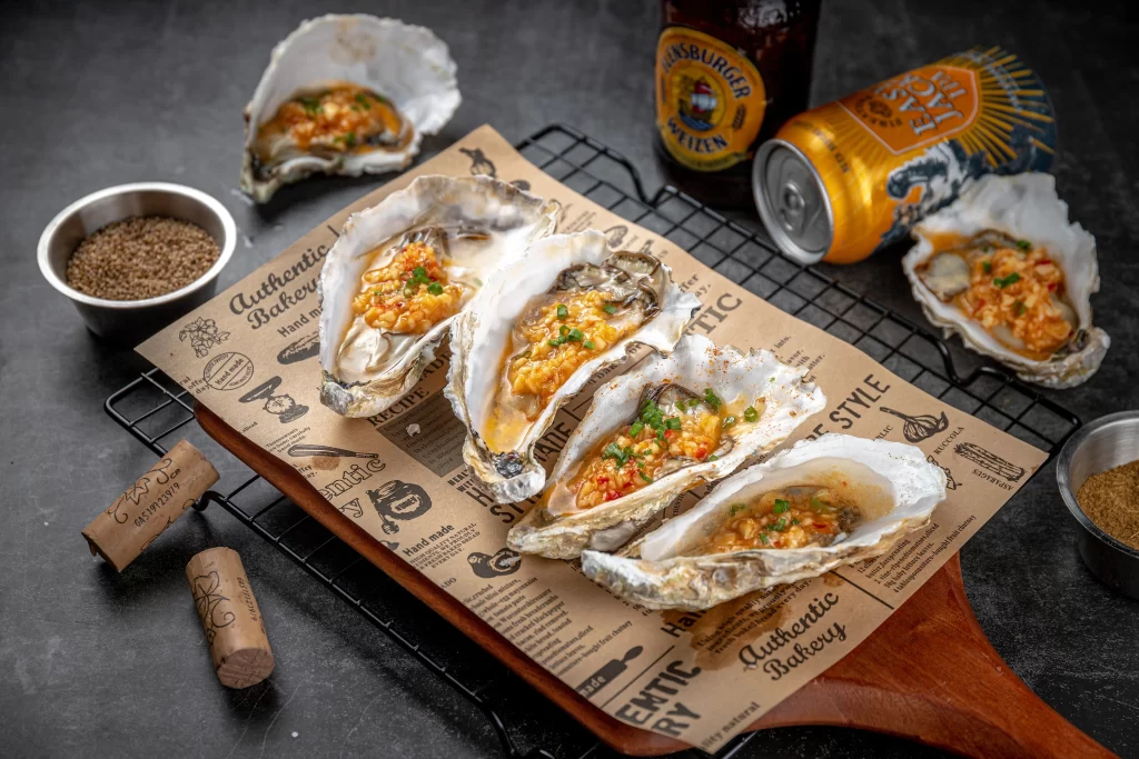 Grilled Oysters with Spicy Garlic Topping Golden Brown