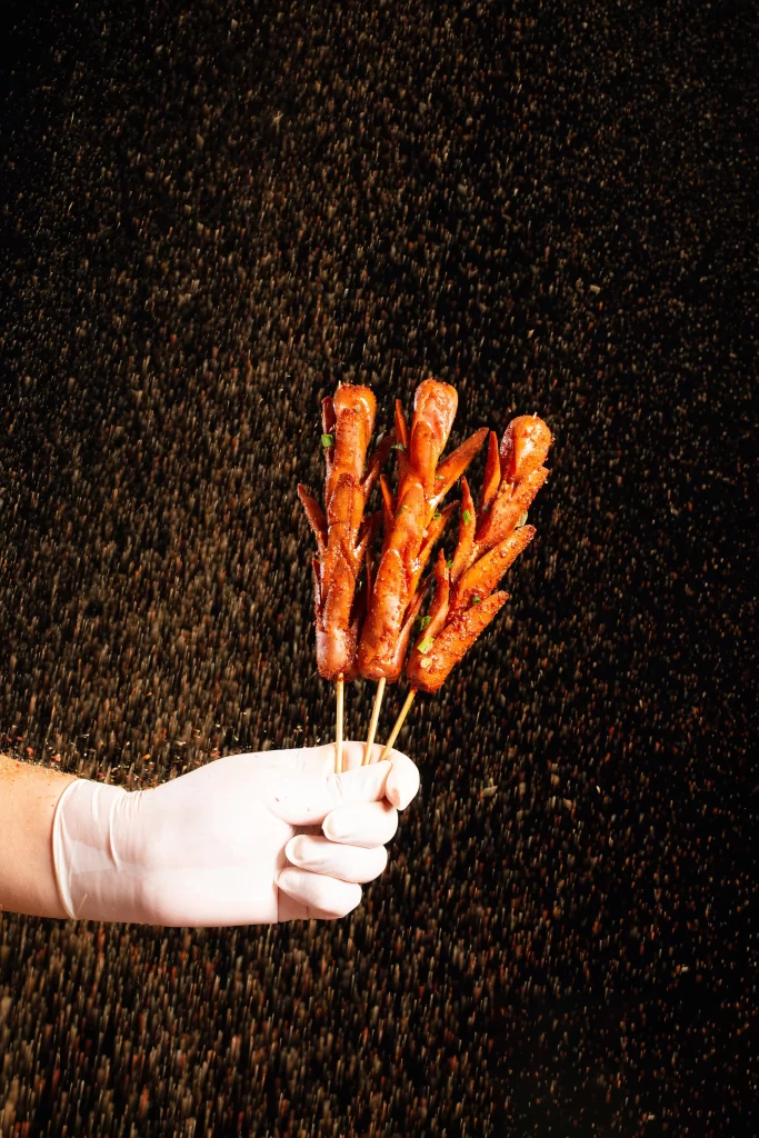 Grilled Sausage Skewers Charred Crust Green Onion Garnish