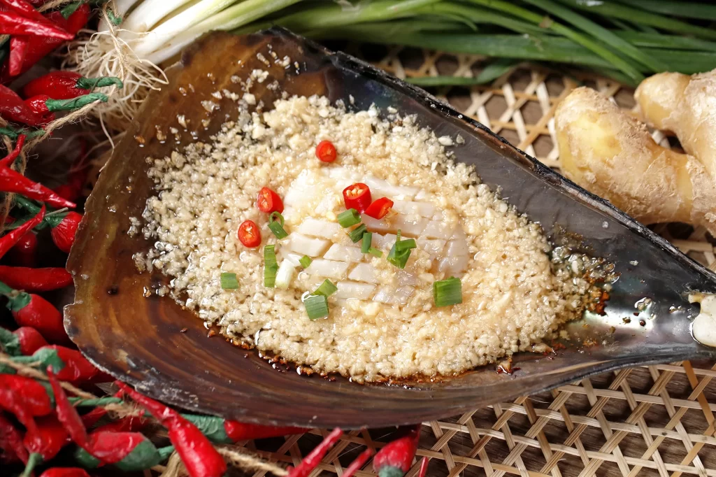 Grilled Seafood with Garlic and Chili Garnish