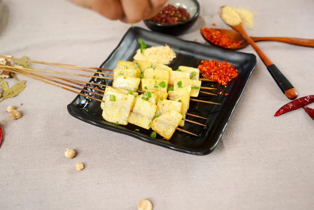 Grilled Tofu Skewers Golden Brown Crispy Green Onion Garnish