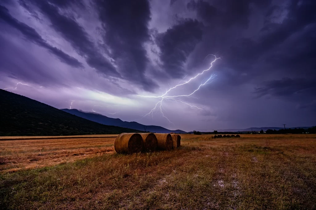 Hay Bale Field Lightning Storm Purple Blue
