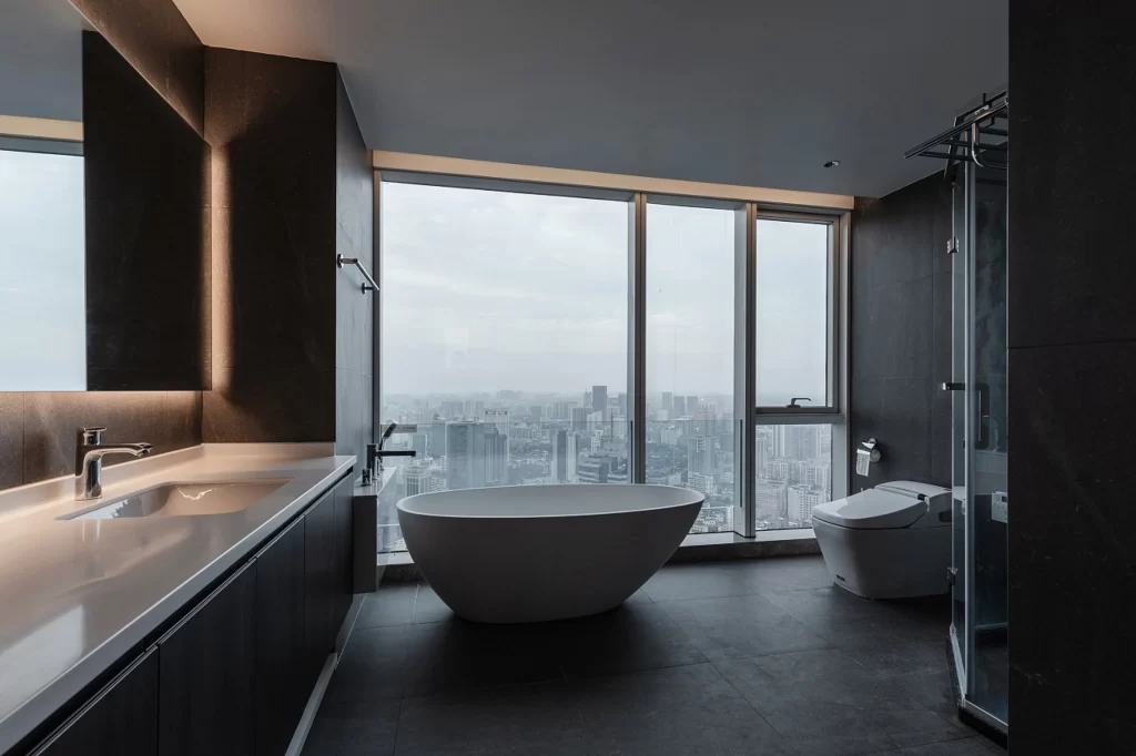 Luxury Bathroom Dark Tones Glass Shower Freestanding Tub City View