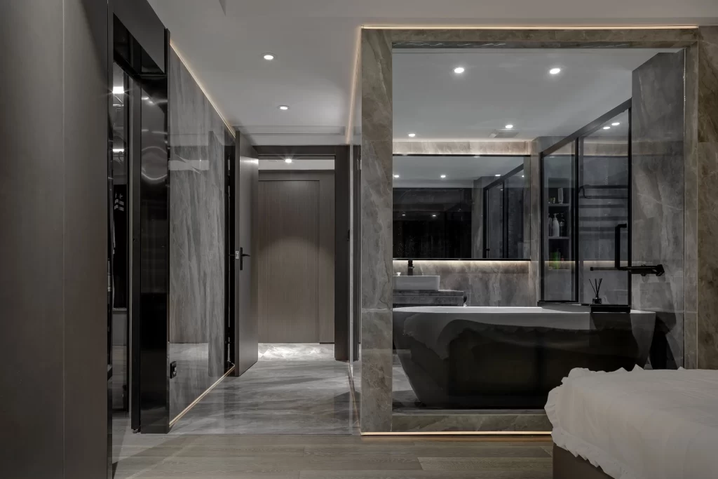 Luxury Bathroom Dark Tones Marble Accents Glass Walls Recessed Lighting