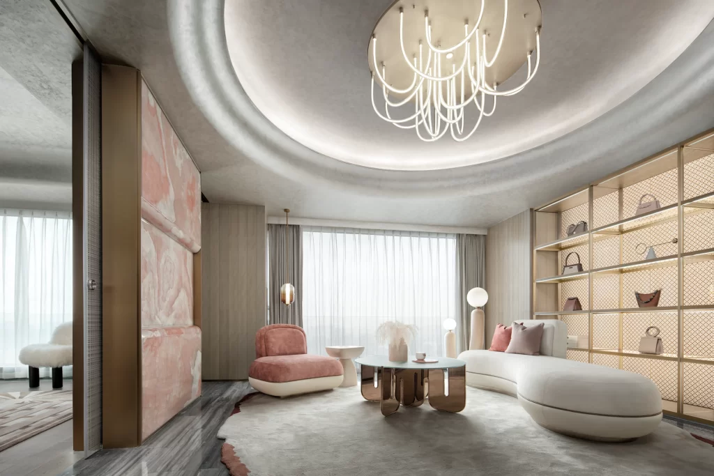 Luxury Contemporary Living Space Soft Pink Neutral Tones Curved Furniture