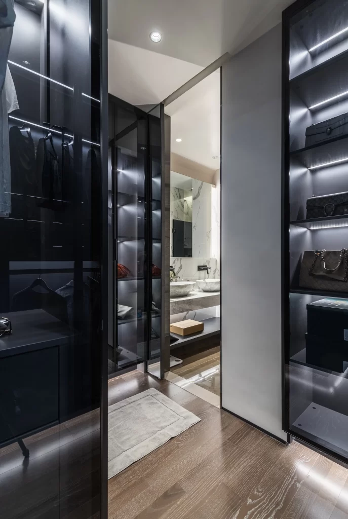 Luxury Walk-in Closet Black Glass Contemporary Neutral Lighting