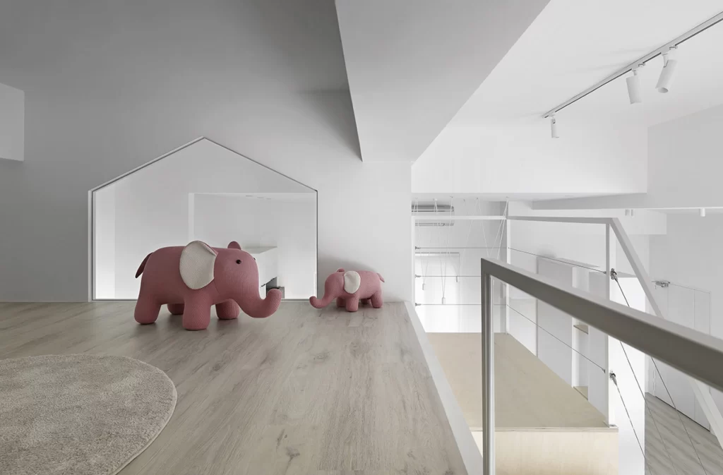 Minimalist Playroom White Neutral Light Wood Pink Elephant