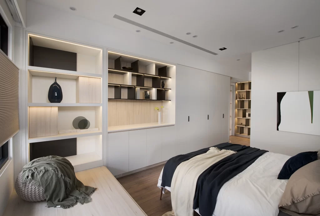 Modern Bedroom Neutral Tones Built-in Shelving Soft Lighting