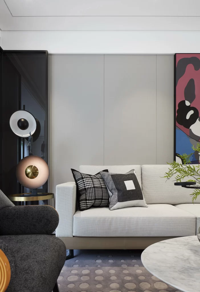 Modern Contemporary Living Room Neutral Beige Black White Patterned Cushions Abstract Art