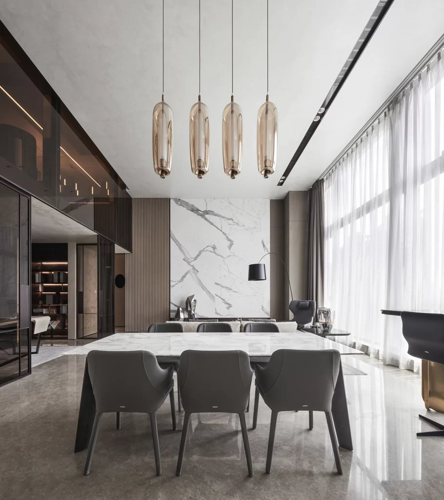 Modern Dining Room Neutral Tones Marble Accents Glass Lighting
