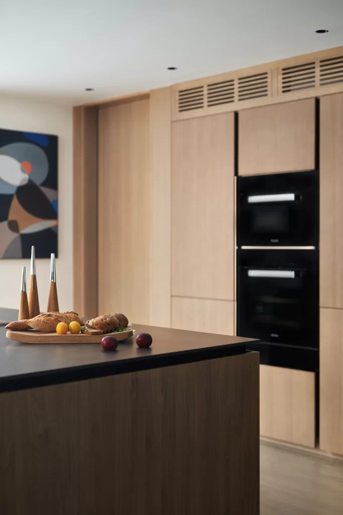 Modern Kitchen Neutral Wood Black Appliances Artistic