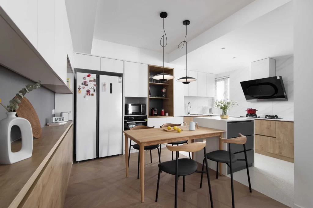 Modern Kitchen White Cabinets Wood Flooring Black Accents
