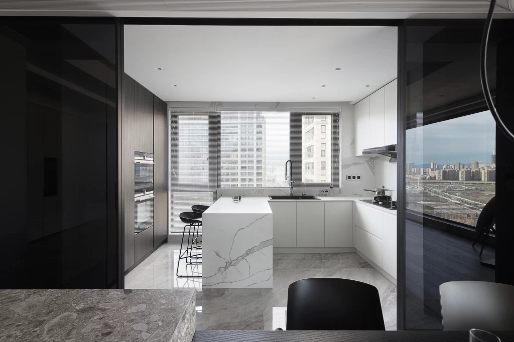 Modern Kitchen White Marble Black Accents Large Windows